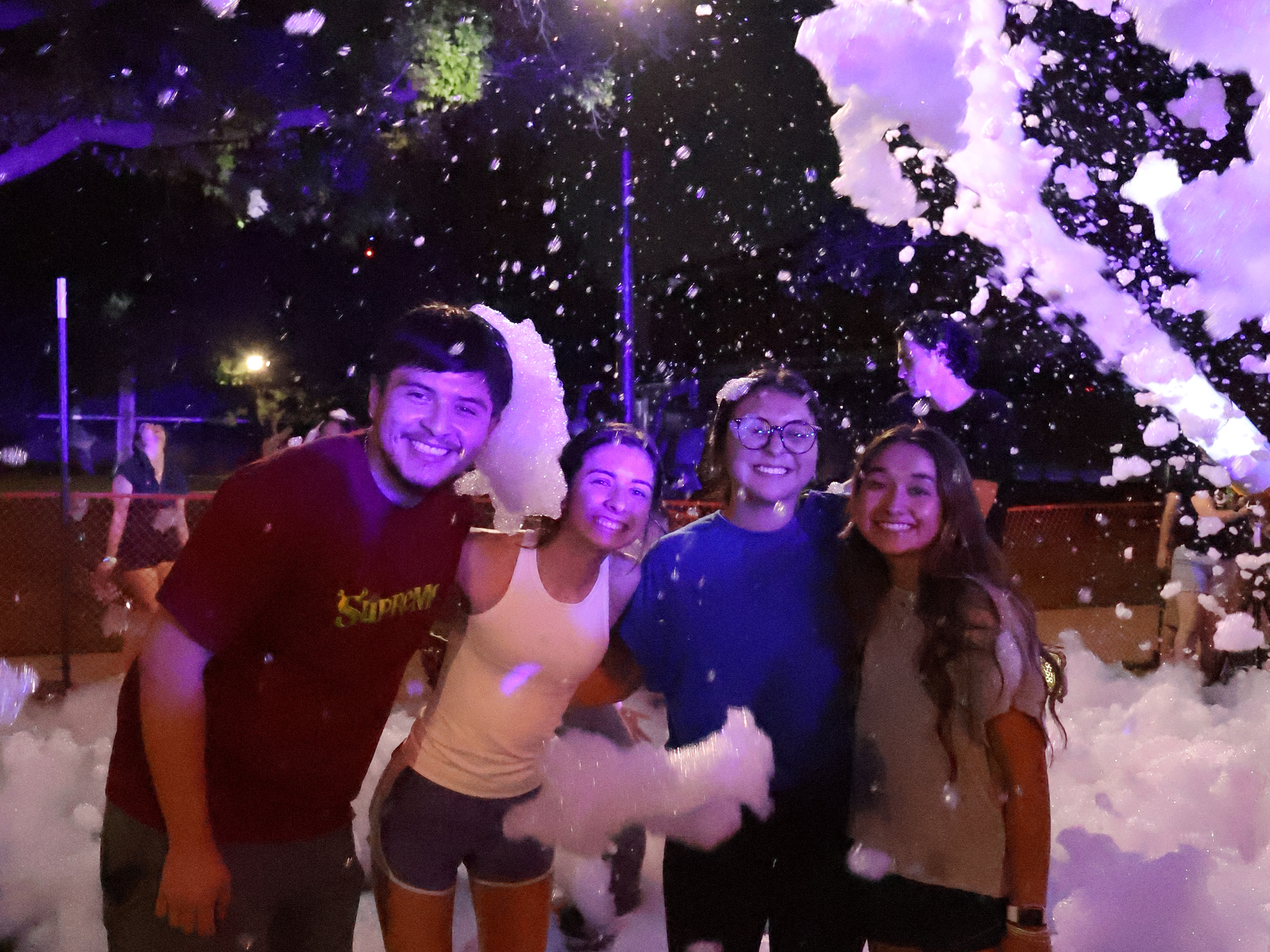 Students attending SAC sponsored Foam Party on the Rhatigan Student Center Courtyard
