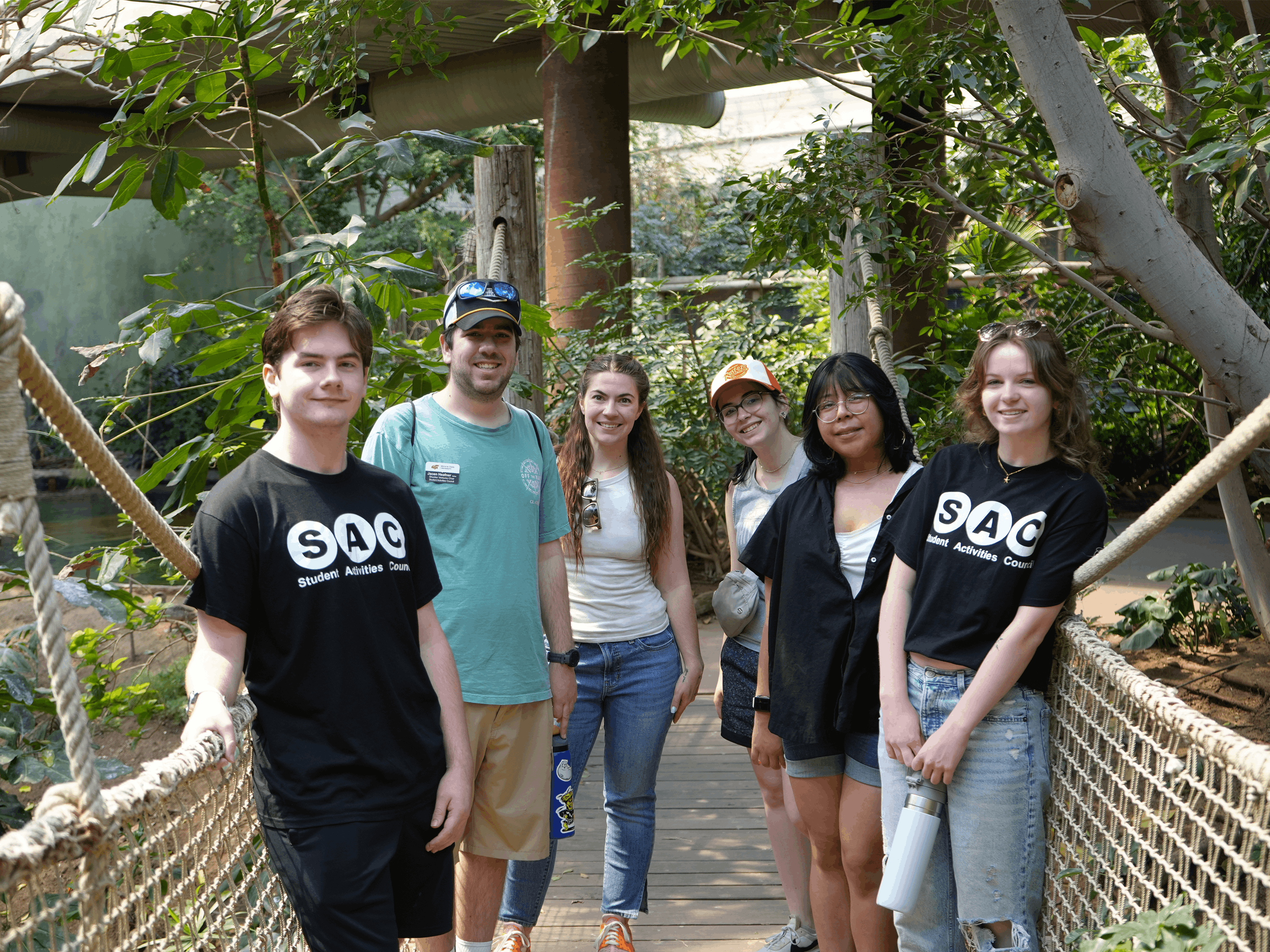 SAC students posing for the camera during a zoo trip.