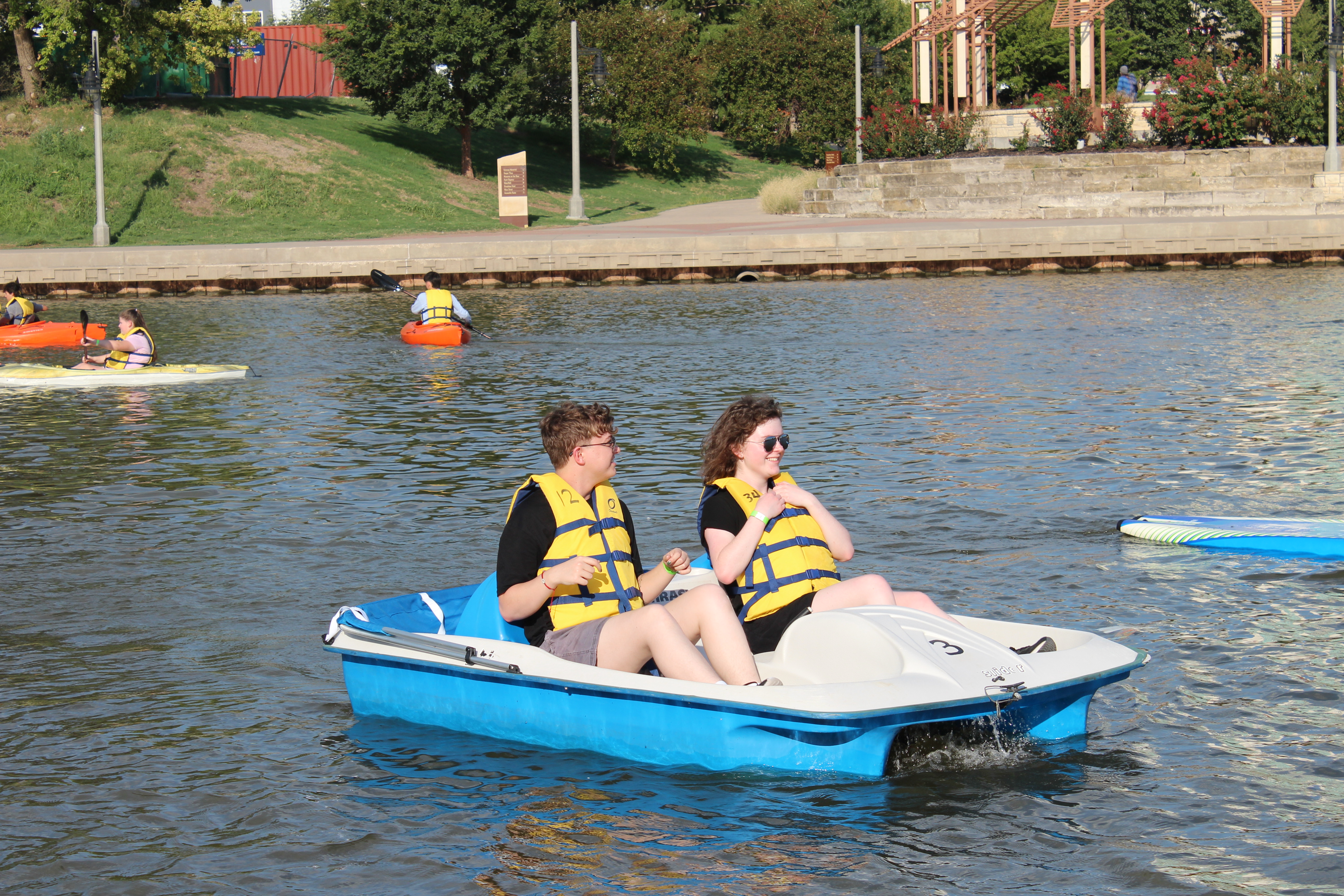 2 students on the pedal boat