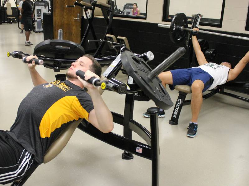 Two men lifting in the Heskett Center
