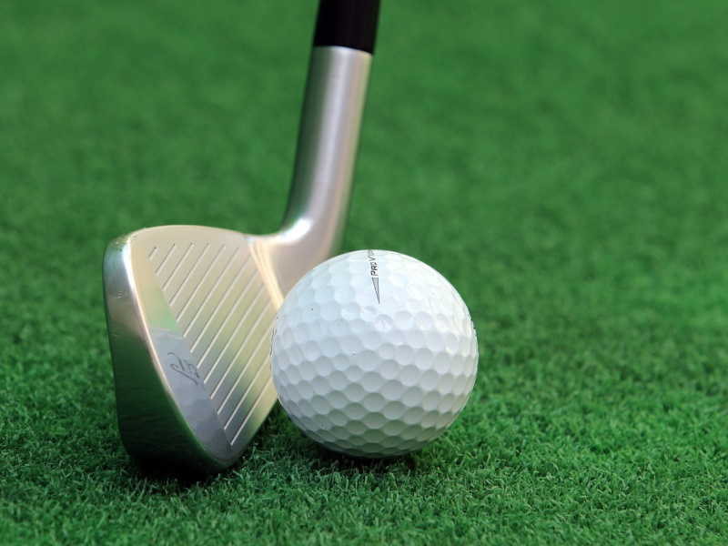 Golf ball and club