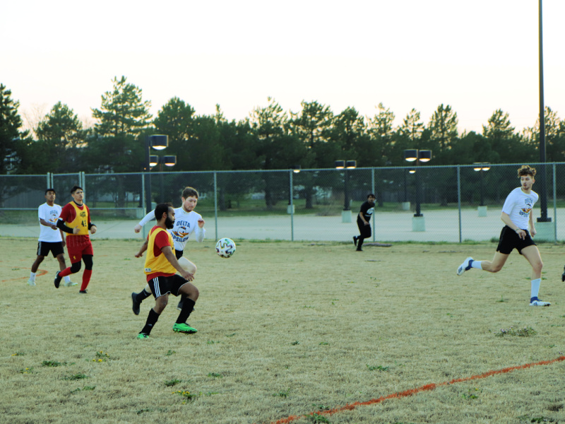 Students playing soccer at the outdoor fields at the Metroplex