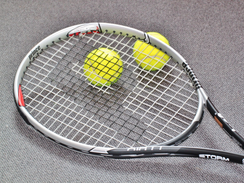 Tennis racquet and tennis balls