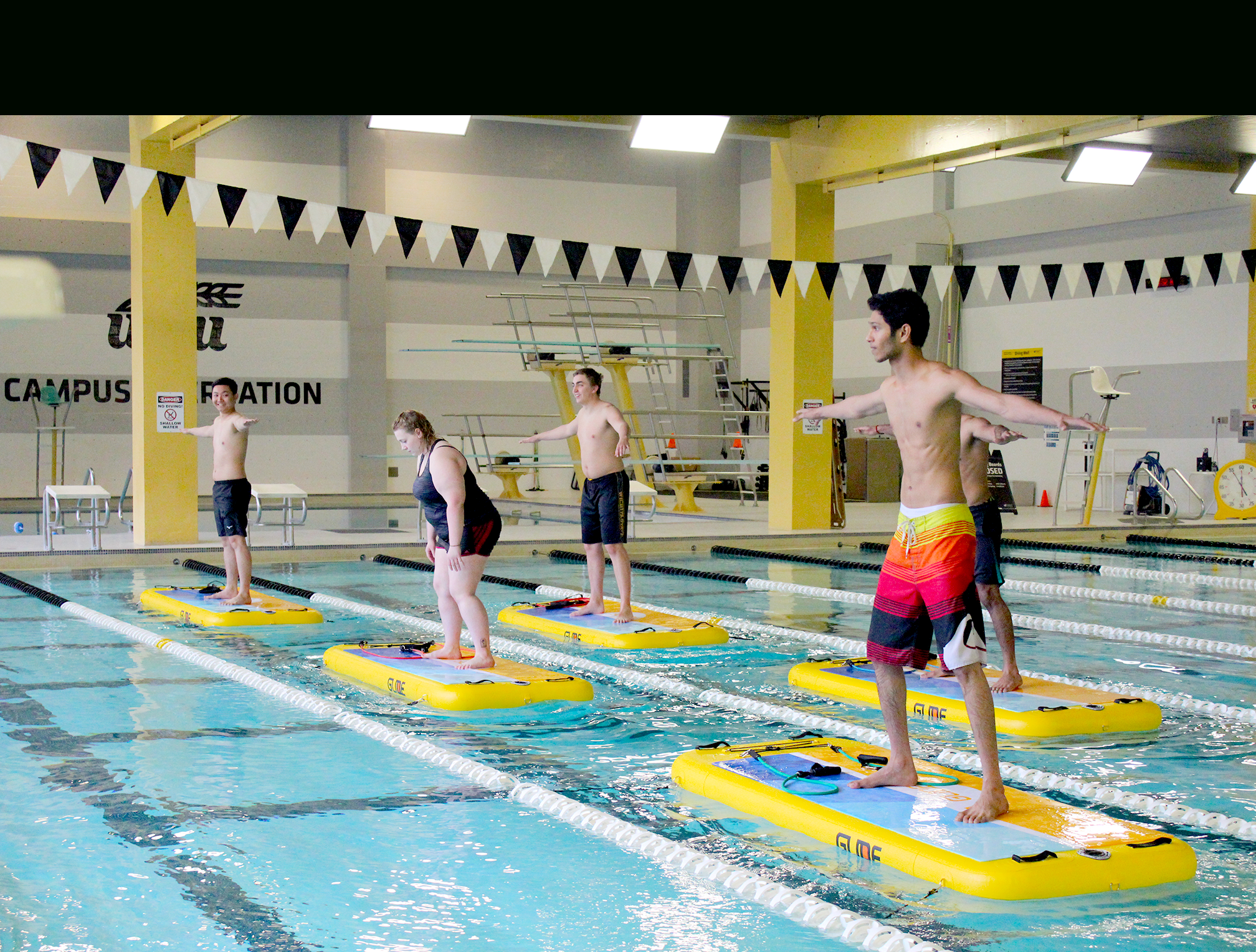 People doing glidefit in the pool. Glidefit is fun you should try it.