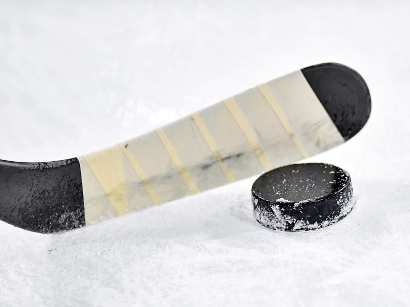 ice hockey stick and puck