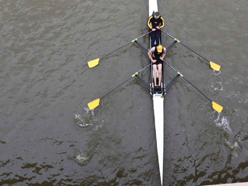 Shocker Rowing shell with rowers