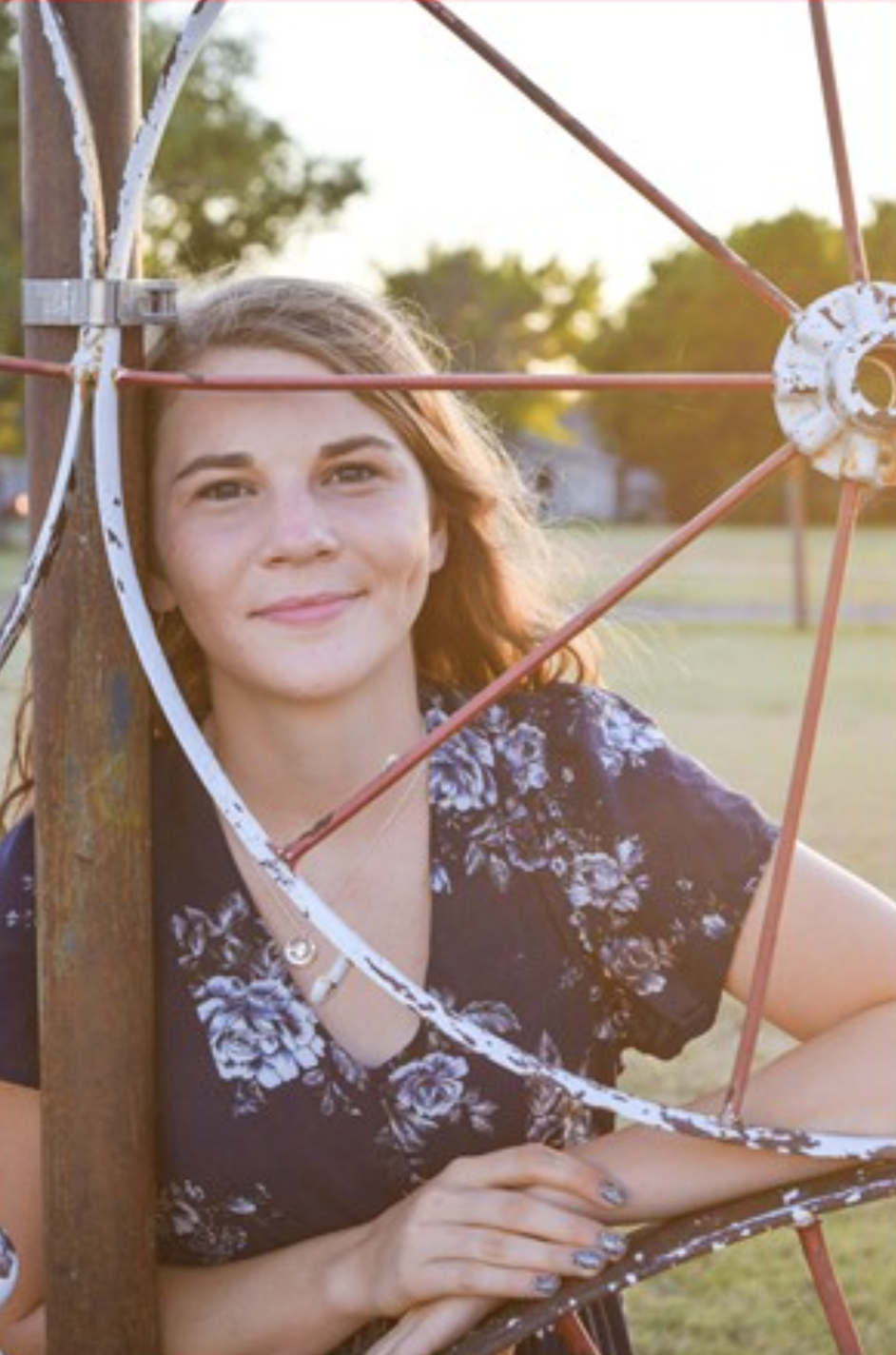 Autumn princ posing with a wheel 