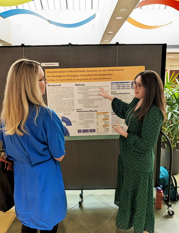 Rory Mata presenting to a woman 