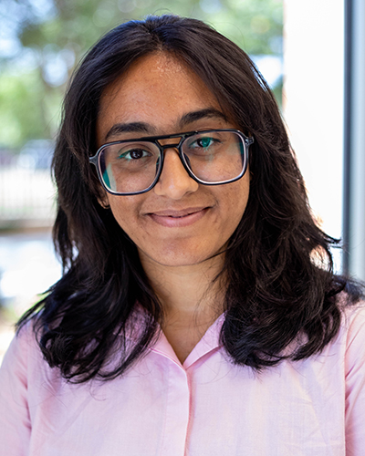 Professional photo of Nidhi Shenoy.