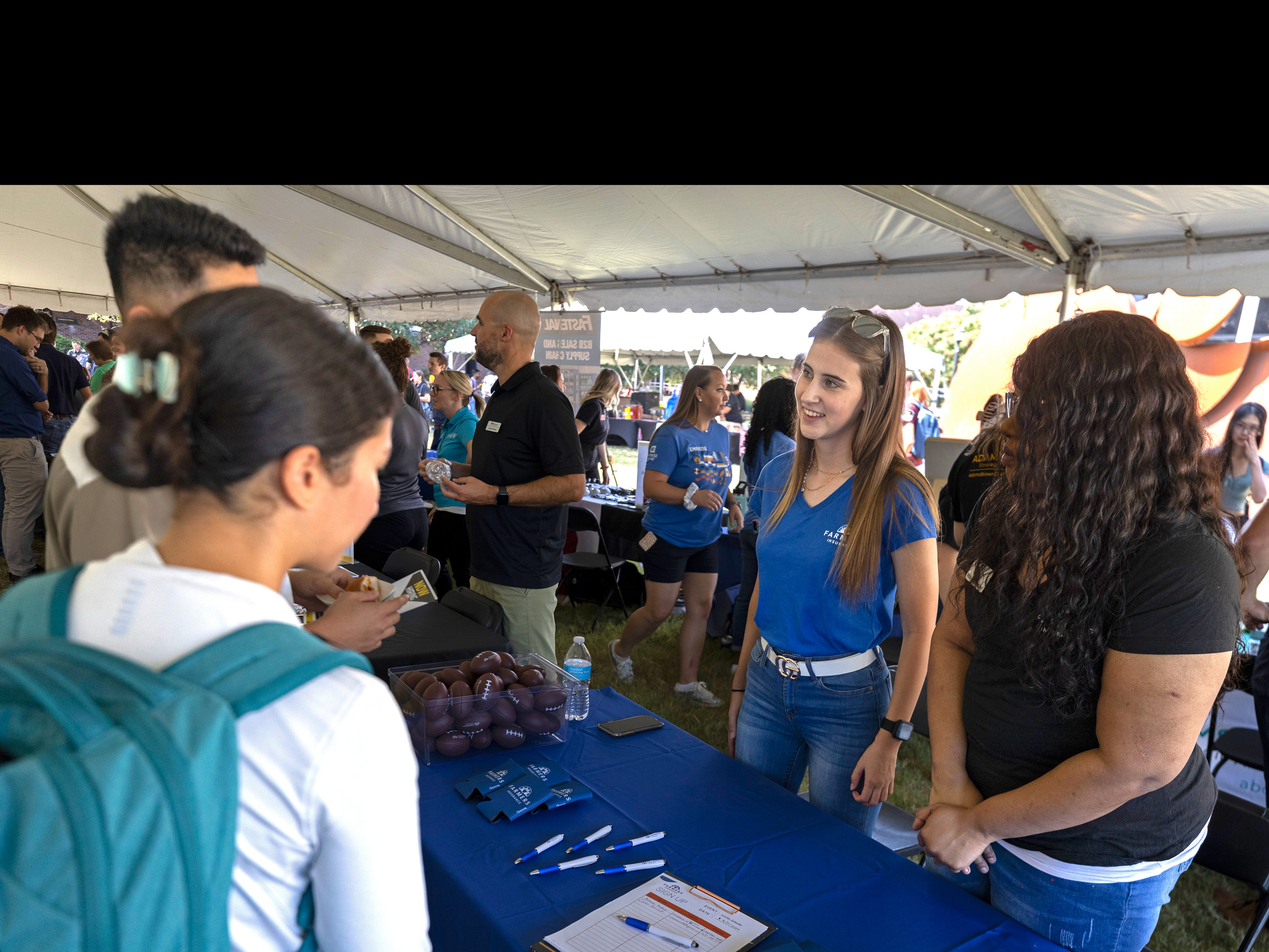 Employer talking to students