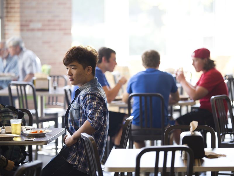 students eating and talking