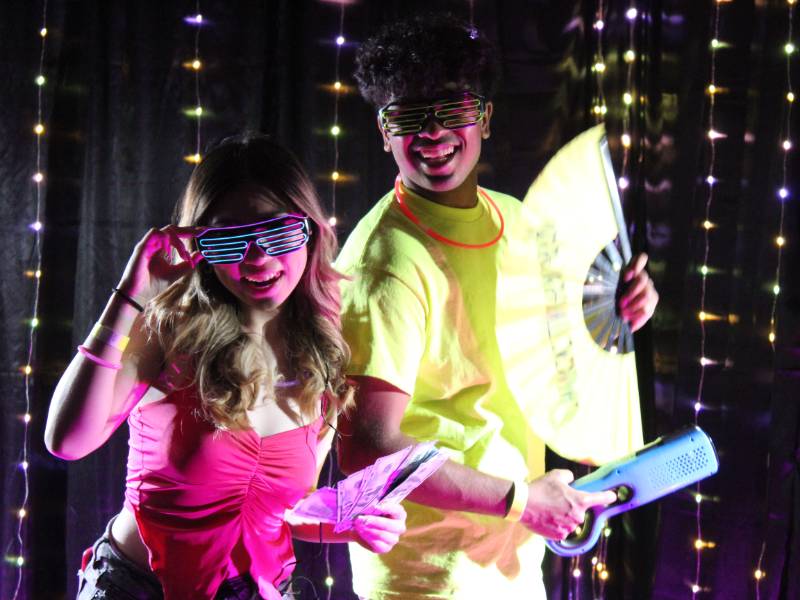 2 students at the SAC sponsored Glow Party
