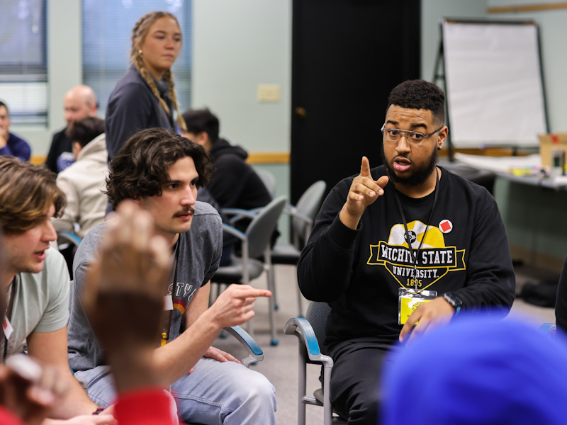 students in conversation at the Shocker Leadership Experience