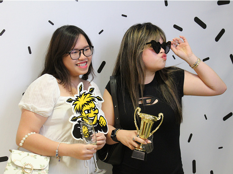 Students posing at the Lamphouse photo booth
