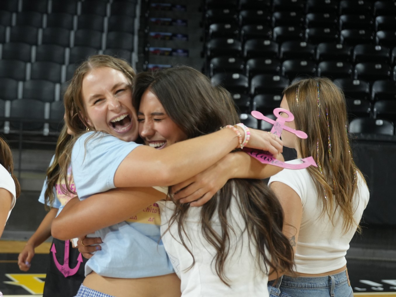 Women meeting their new sorority sisters at Bid Day